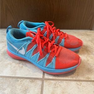 Nike Women’s Flyknit Lunar 2 Blue/Red Orange Color Size 8